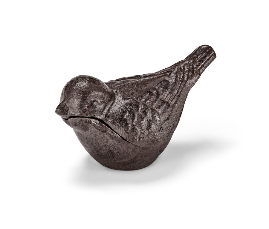 Une cachette pour clés marron en forme d'oiseau.