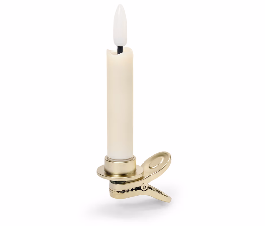 Bougie LED beige avec clip sur base dorée.