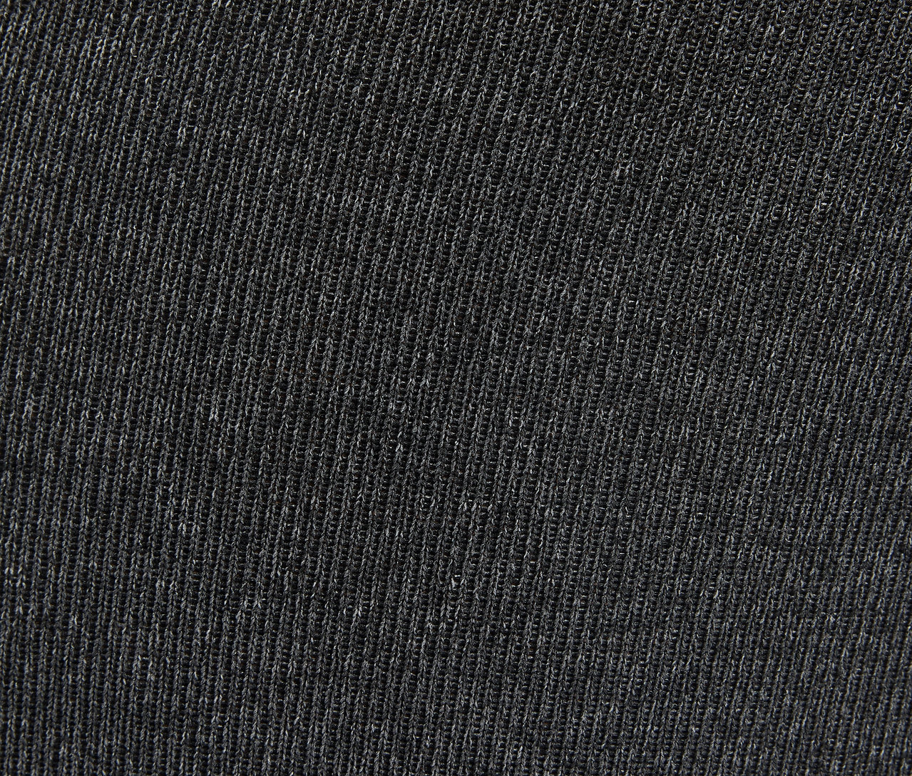 Gros plan d'un tissu tricoté gris.