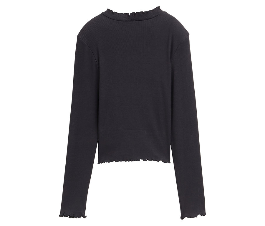 T-shirt noir à manches longues avec bordures à volants.