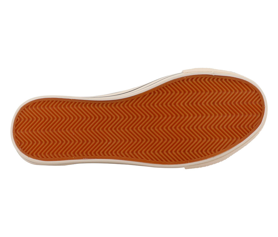 Semelle d'une chaussure avec un motif orange en zigzag.