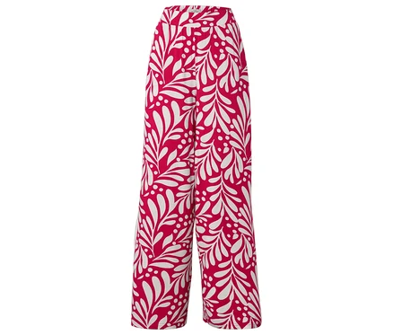 Pantalon rouge avec motif de feuilles blanches.