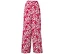Pantalon rouge avec motif de feuilles blanches.