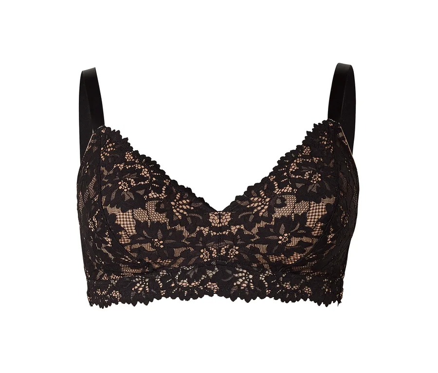 Une brassière en dentelle noire avec une doublure couleur chair, un motif floral et des bords festonnés, sur fond blanc.