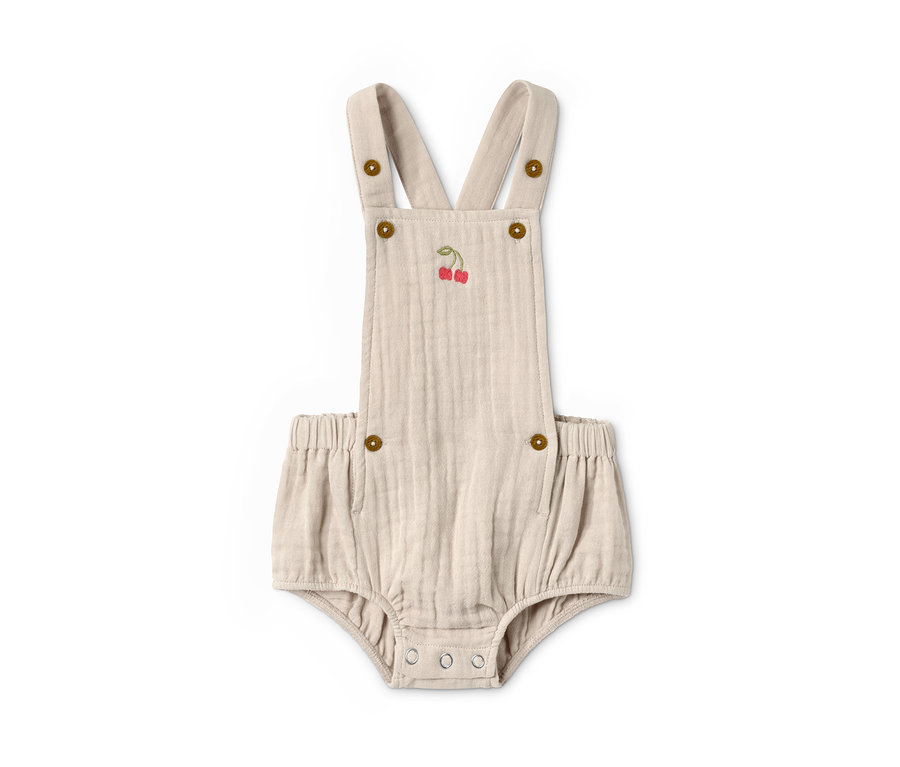 Barboteuse avec broderie de cerises et boutons.