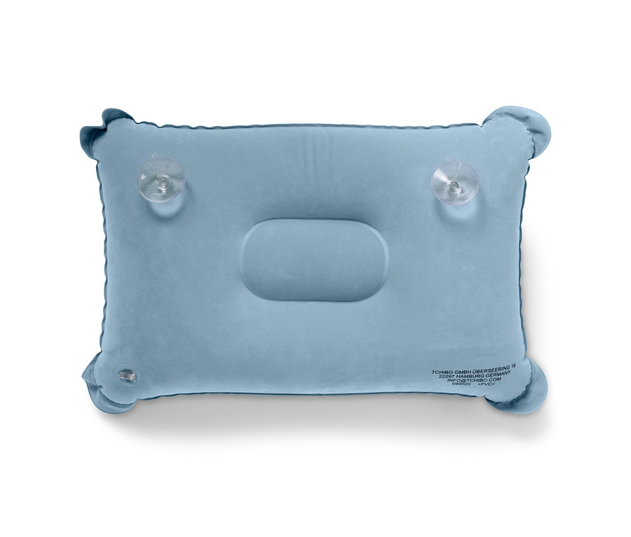 Coussin de baignoire bleu clair avec ventouses.