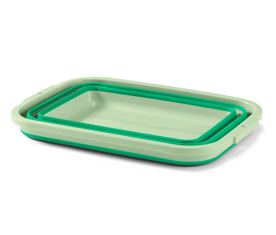 Un panier à linge et à vaisselle pliable vert clair avec des accents vert foncé.