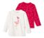 Deux t-shirts à manches longues pour enfant : un blanc avec un flamant rose, un rouge à pois.