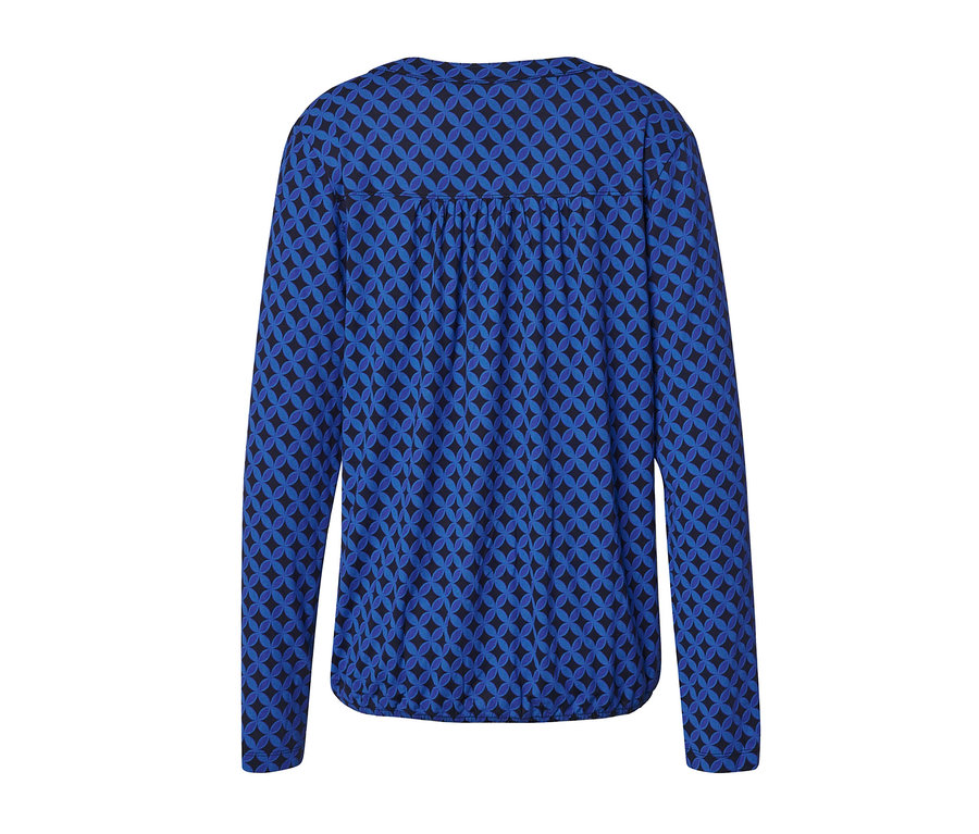 Chemisier bleu cobalt imprimé à manches longues avec motif géométrique bleu sur l'ensemble.