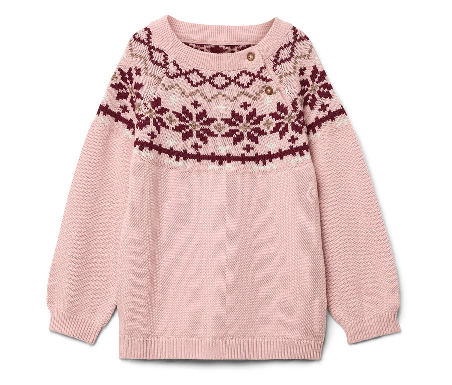 Pull rose avec motif de Noël.