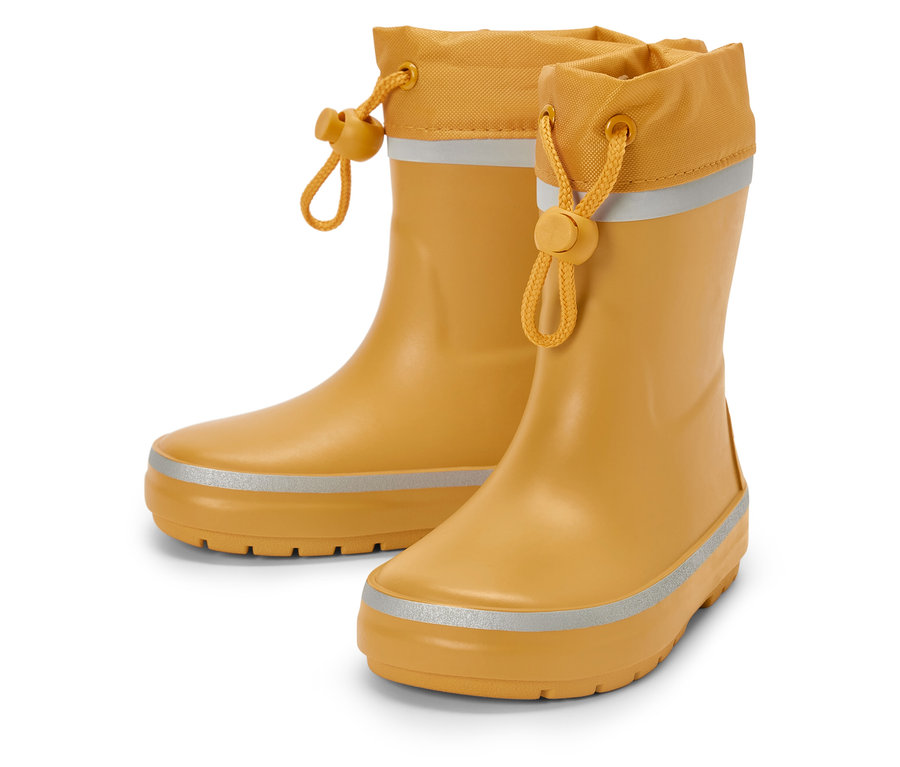 Une paire de bottes en caoutchouc jaunes avec des détails réfléchissants.