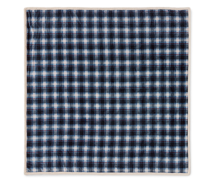 Une couverture à carreaux bleus avec une bordure crème.