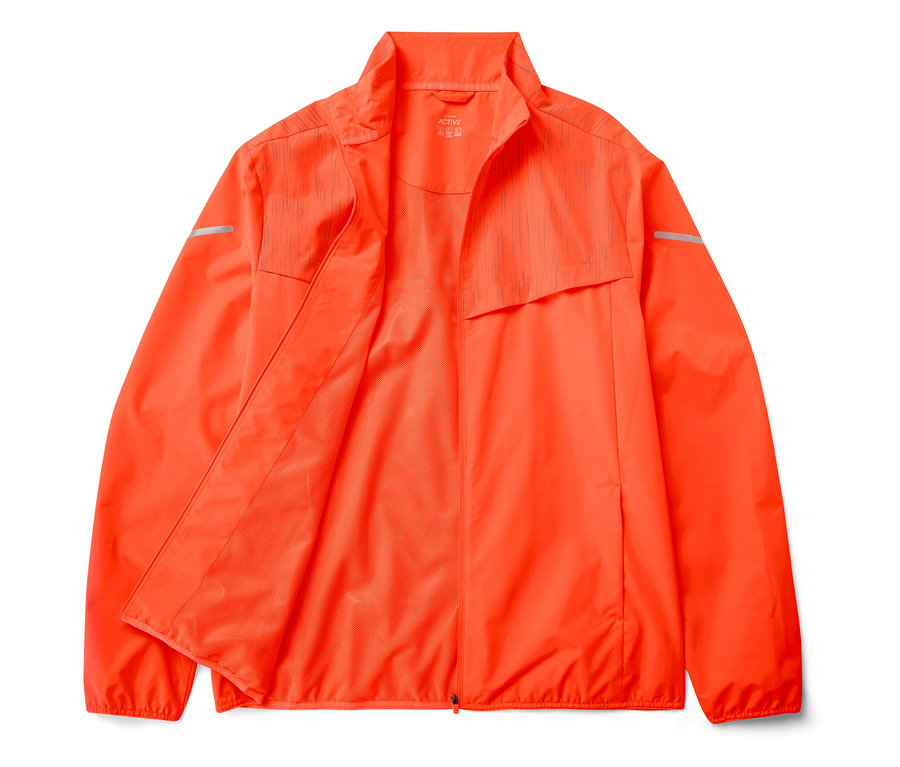 Veste de sport orange avec fermeture éclair ouverte et détails réfléchissants.
