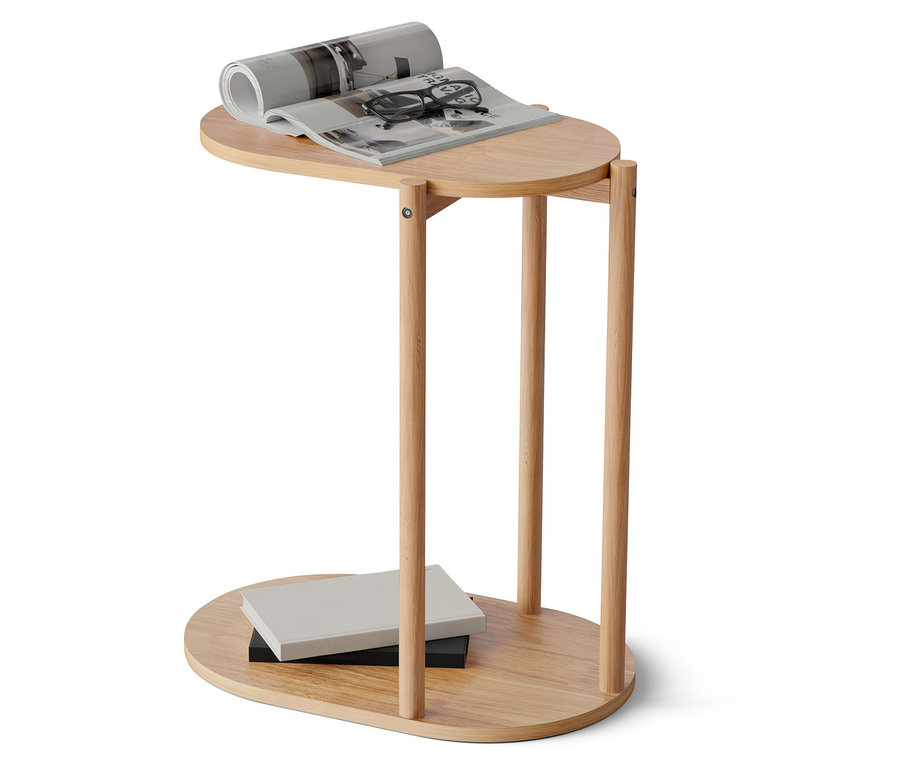 Sur le dessus d'une table en bois se trouvent un magazine ouvert et un journal enroulé. Sur le dessous de la table se trouvent deux livres.