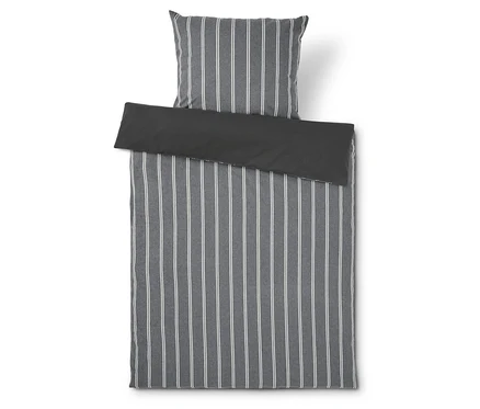 Linge de lit et oreiller à rayures grises.