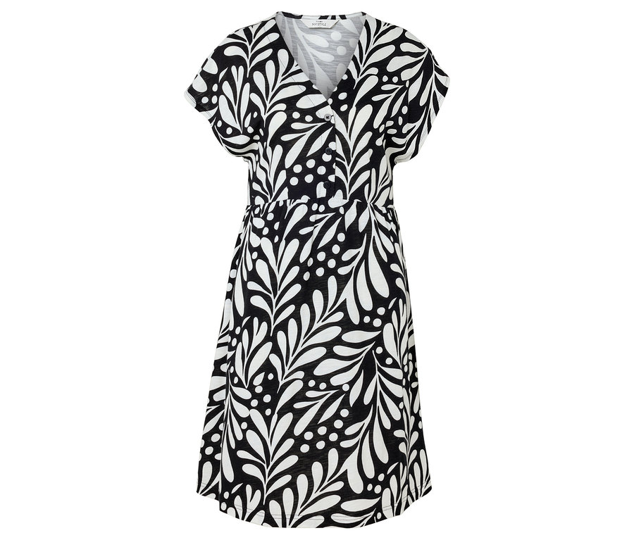 On voit une robe noire avec un motif de feuilles blanches.