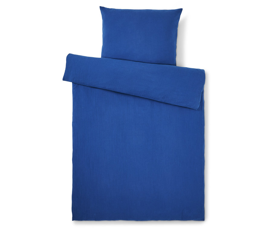 Vue de dessus d'une parure de lit bleue composée d'une taie d'oreiller et d'une housse de couette.