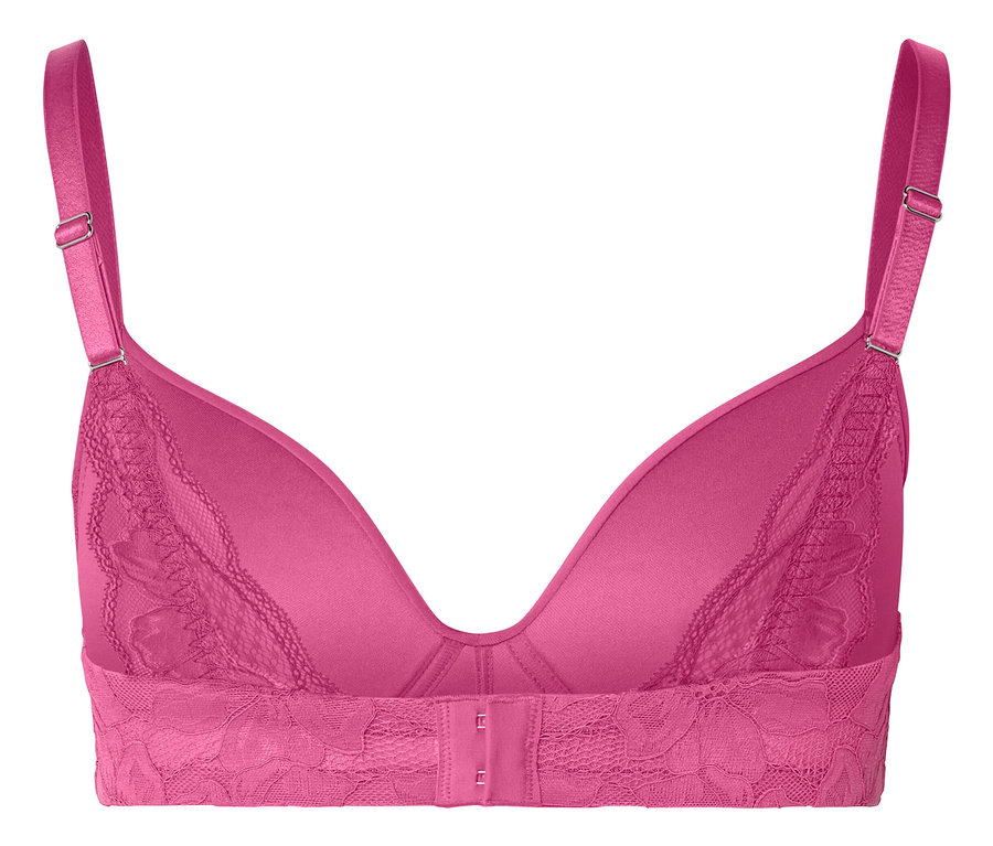 Gros plan d'un soutien-gorge rose avec de la dentelle.