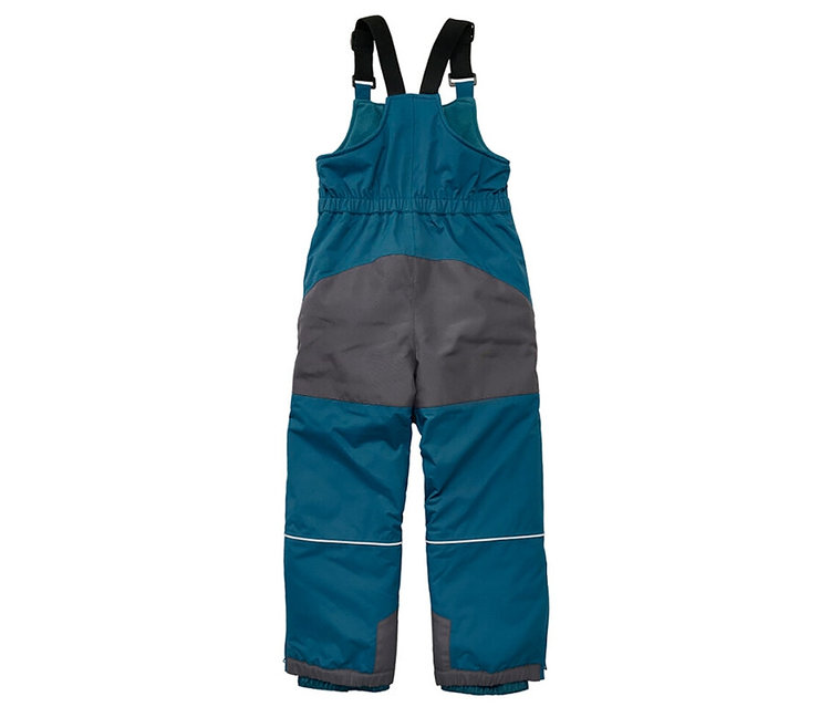 Salopette de ski pour enfant bleu pétrole avec renforts gris aux fesses et aux genoux, bretelles noires et bande réfléchissante.