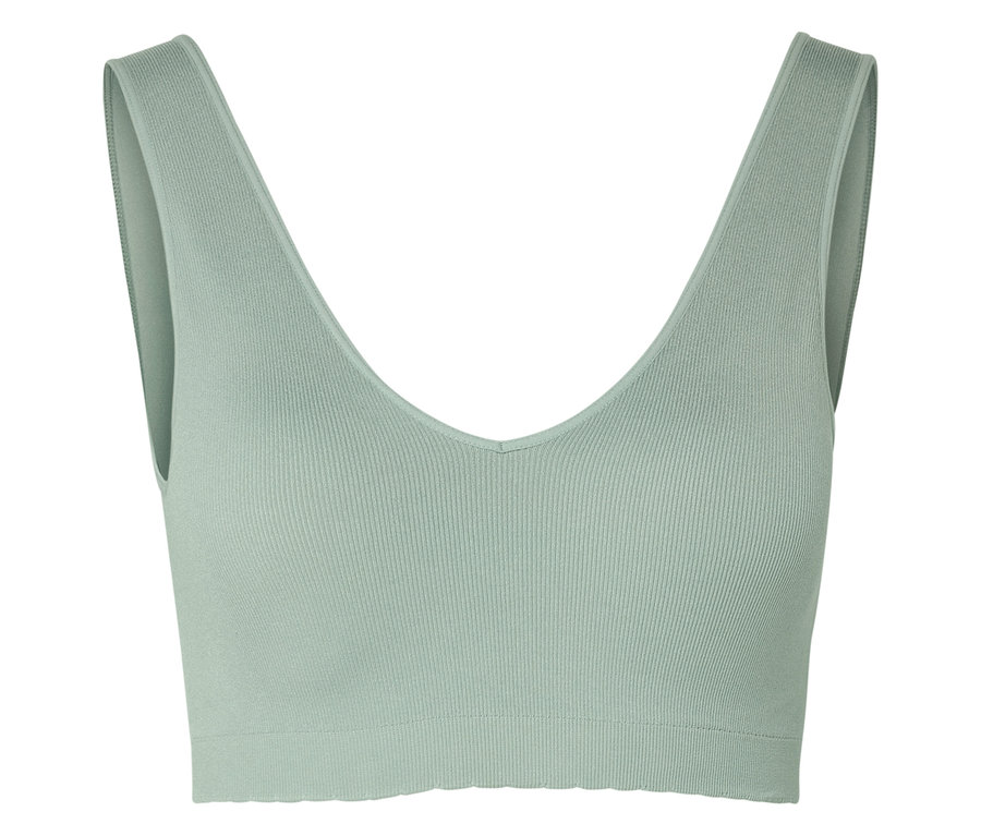 Gros plan d'un soutien-gorge de sport vert menthe à col en V.