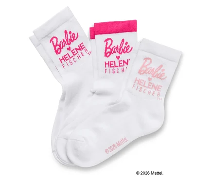 Trois chaussettes blanches avec l'inscription Barbie et Helene Fischer en rose.