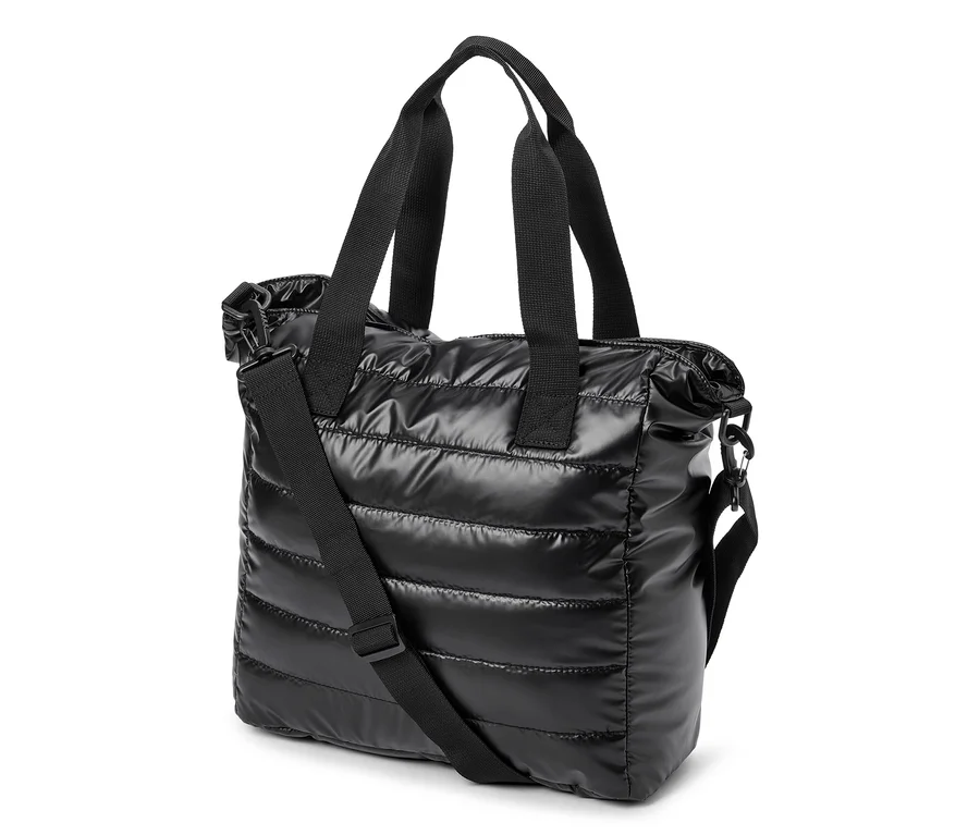 Sac fourre-tout noir matelassé avec deux poignées supérieures et une bandoulière réglable.