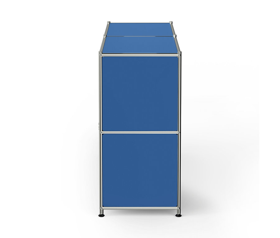 Meuble de rangement modulaire étroit et haut, avec deux compartiments bleus et un cadre argenté.