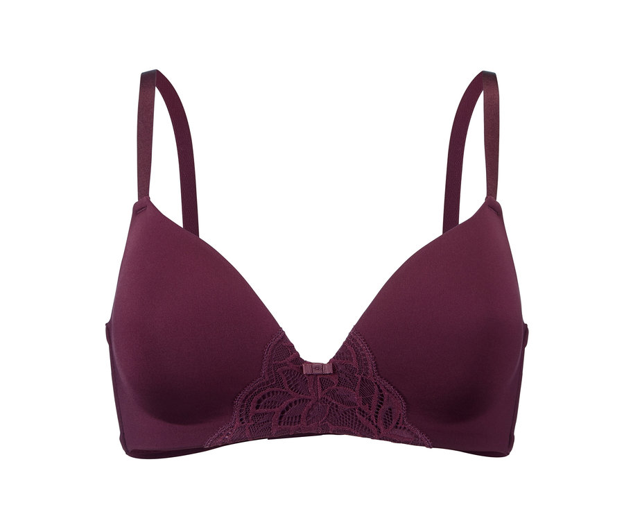 Un soutien-gorge à coques souples violet sur fond blanc.