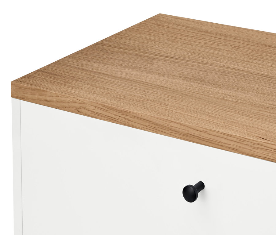 Détail du secrétaire «Bekeson» avec un plateau en bois et un cadre blanc.