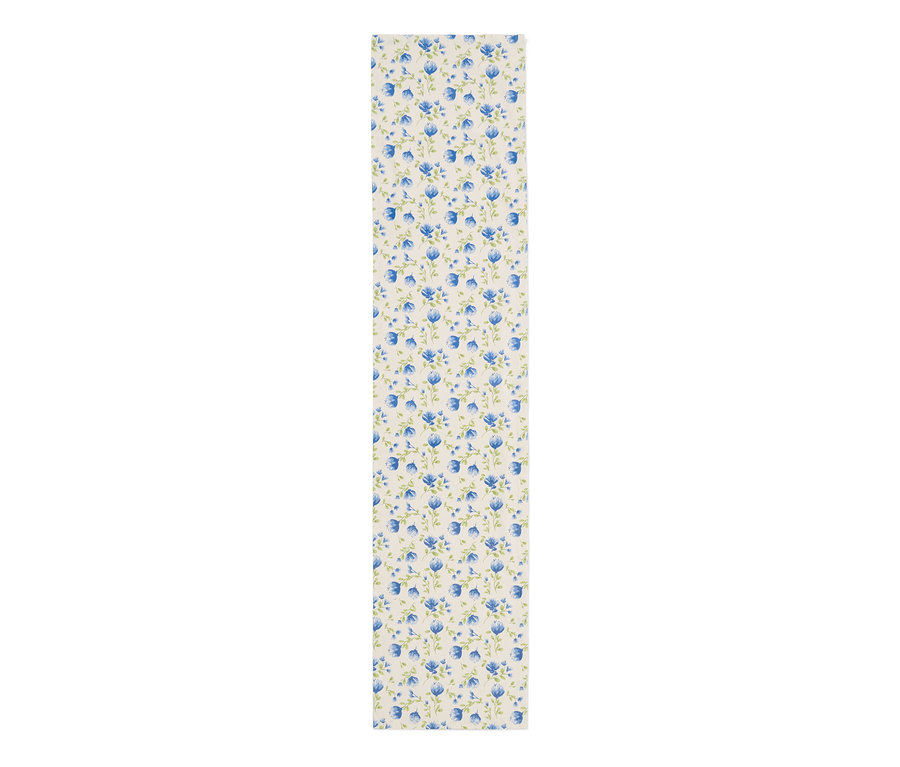 Chemin de table en coton avec motif floral bleu.