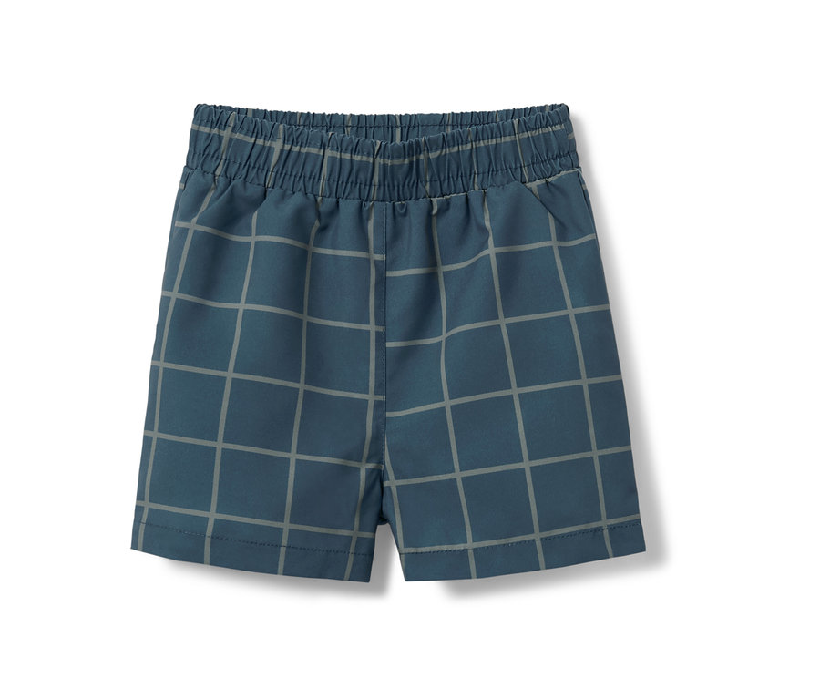 Boardshort pour tout-petit bleu avec motif à carreaux gris.