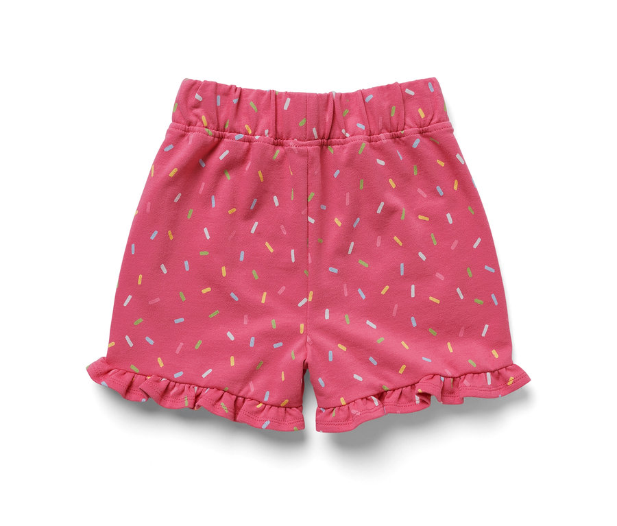 Short de survêtement rose pour enfants avec des confettis colorés et des volants.