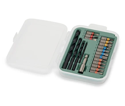 Un jeu d'outils pour visseuses et perceuses dans une boîte ouverte.