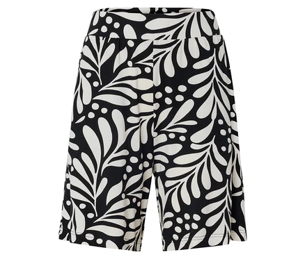 Pantalon à motif de feuilles en noir et blanc.