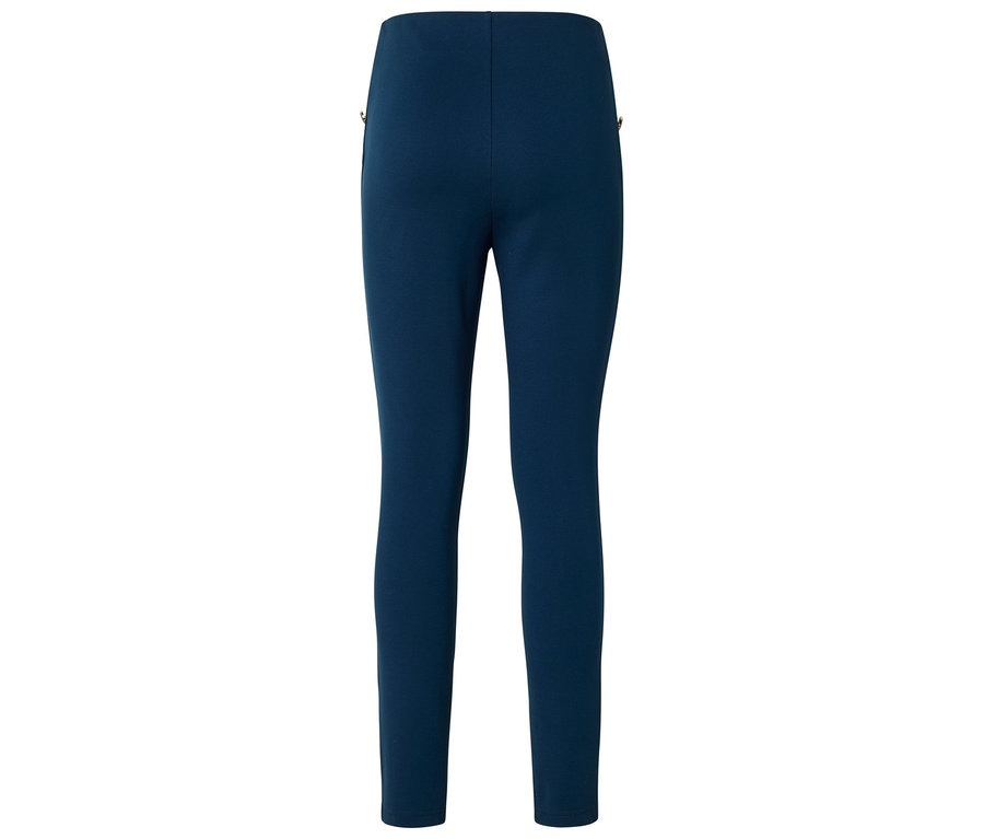 Leggings bleu foncé avec des détails dorés sur les côtés.