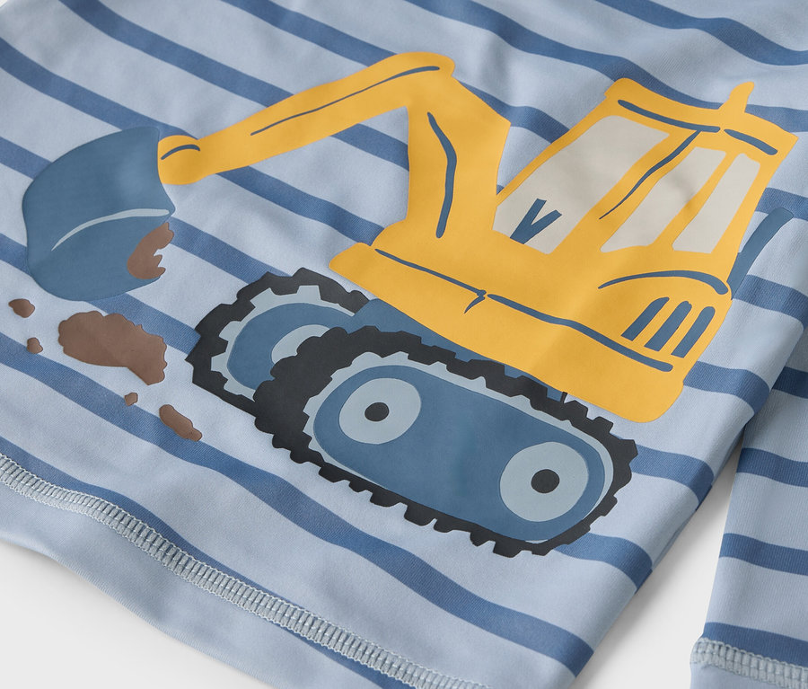 Chemise bleu clair rayée avec impression de pelle jaune.