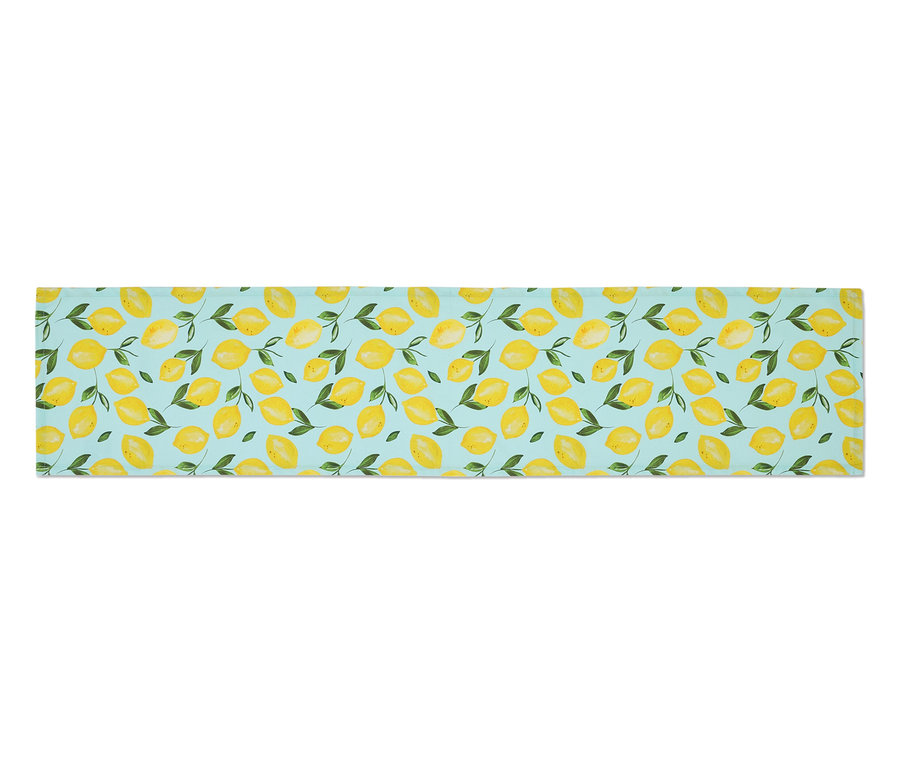Chemin de table avec motif de citrons sur fond bleu clair.