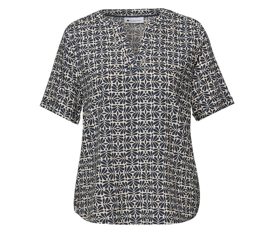 La blouse en maille Street One a un motif de feuilles bleues et des manches courtes.