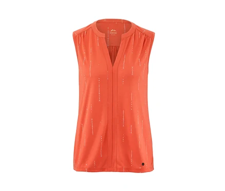 Top fonctionnel orange avec imprimé blanc.