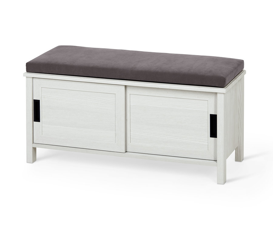 Un banc blanc avec rangement et une assise rembourrée grise.