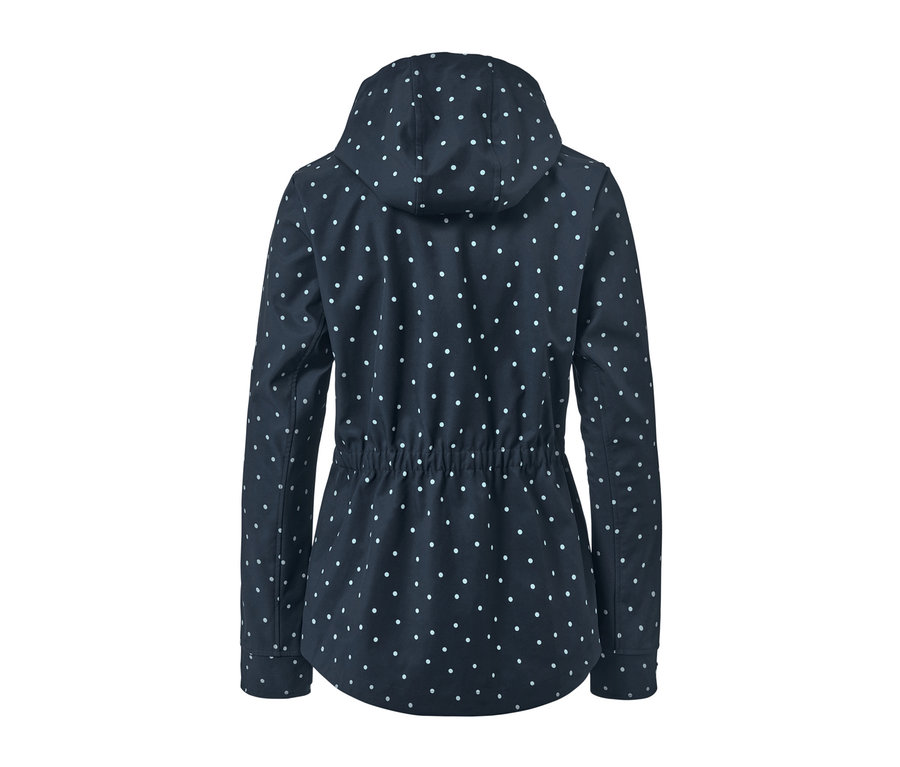 Veste en softshell bleu marine à pois blancs.