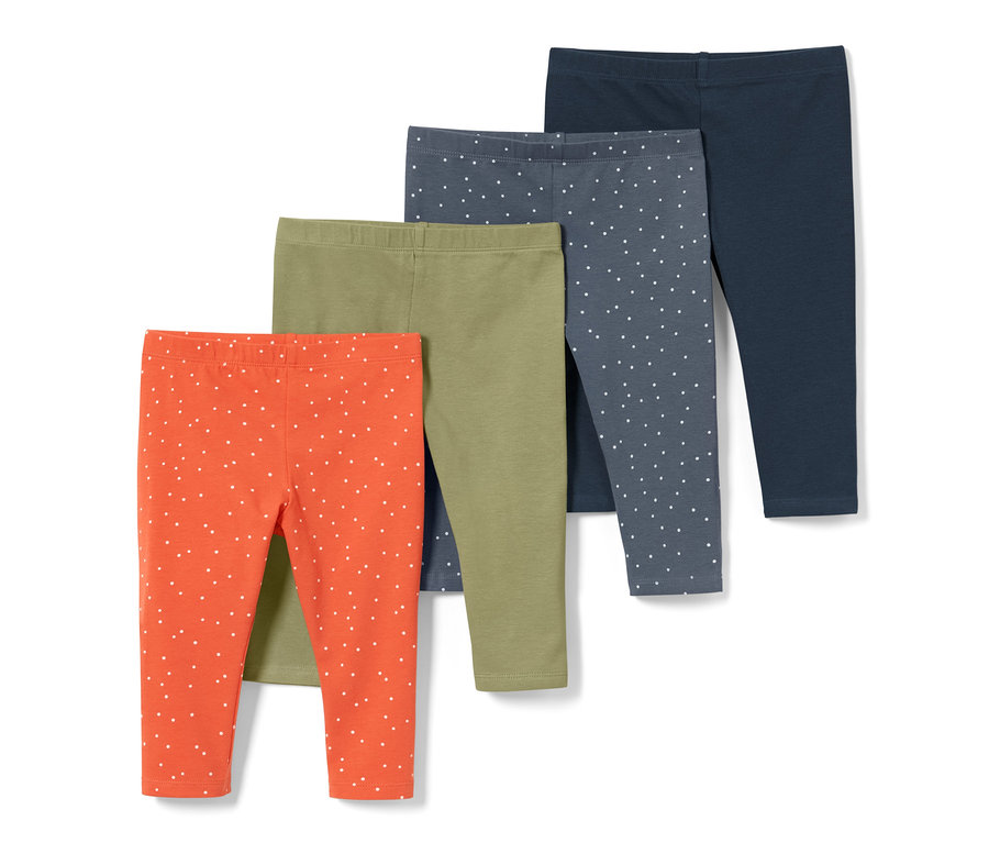 Quatre leggings 3/4 pour bébés et jeunes enfants : orange à pois blancs, vert olive, gris à pois blancs et bleu marine.