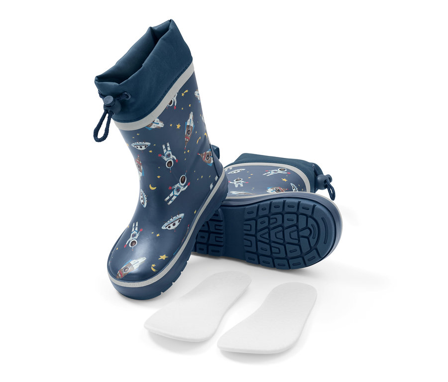 Bottes de pluie bleues avec motif spatial et semelles intérieures blanches.