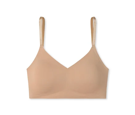 Brassière invisible SCHIESSER beige avec coussinets et fines bretelles.