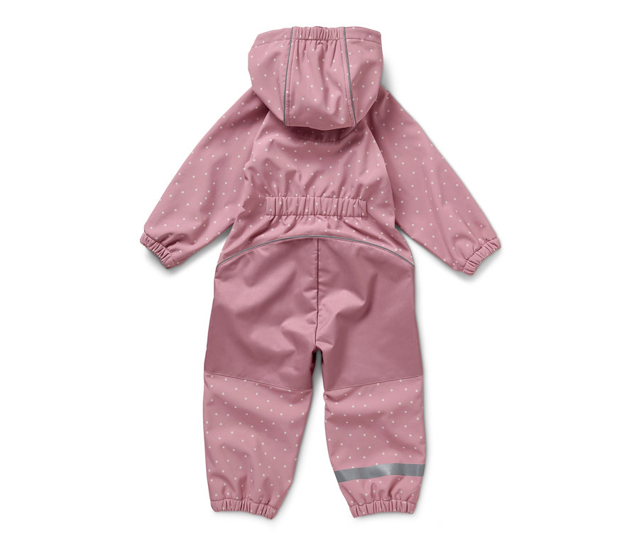 Combinaison en softshell rose pour enfant avec des pois blancs vue de dos.