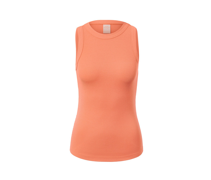 Gros plan sur un haut de sport orange d'un ensemble deux pièces.