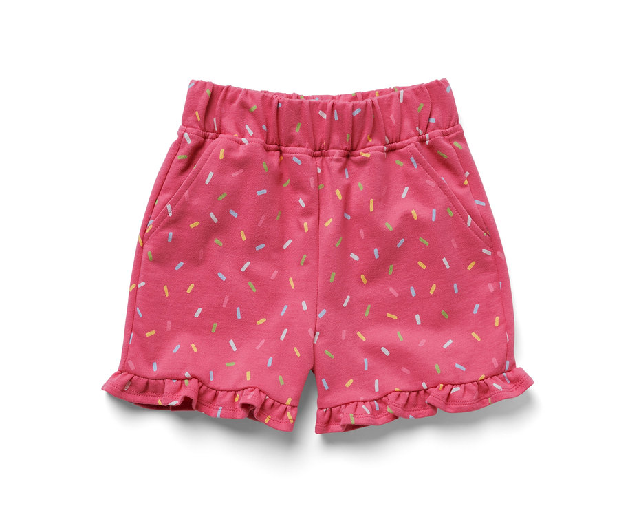 Short de survêtement rose pour enfants avec des motifs colorés.