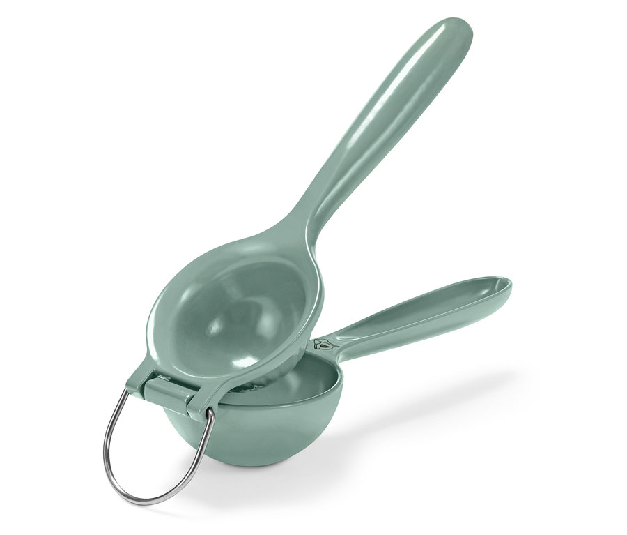 Presse-agrumes vert avec poignée argentée.