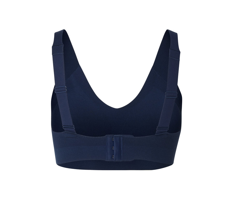 Vue détaillée d'un soutien-gorge de sport bleu marine avec bretelles réglables et fermeture à agrafes.