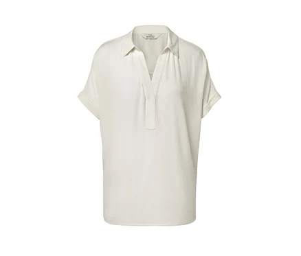 Blouse crème à manches courtes.